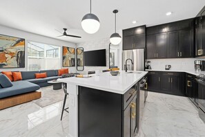 Fridge, microwave, oven, stovetop - Ford's Fable | Treasure Themed BR, Luxe Decor & High End Amenities - Near Disney (Orlando)