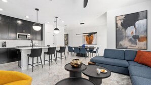 Living area - Victoria's Villa | Pool, patio games, full kitchen, kids' theme BR - near parks (Orlando)