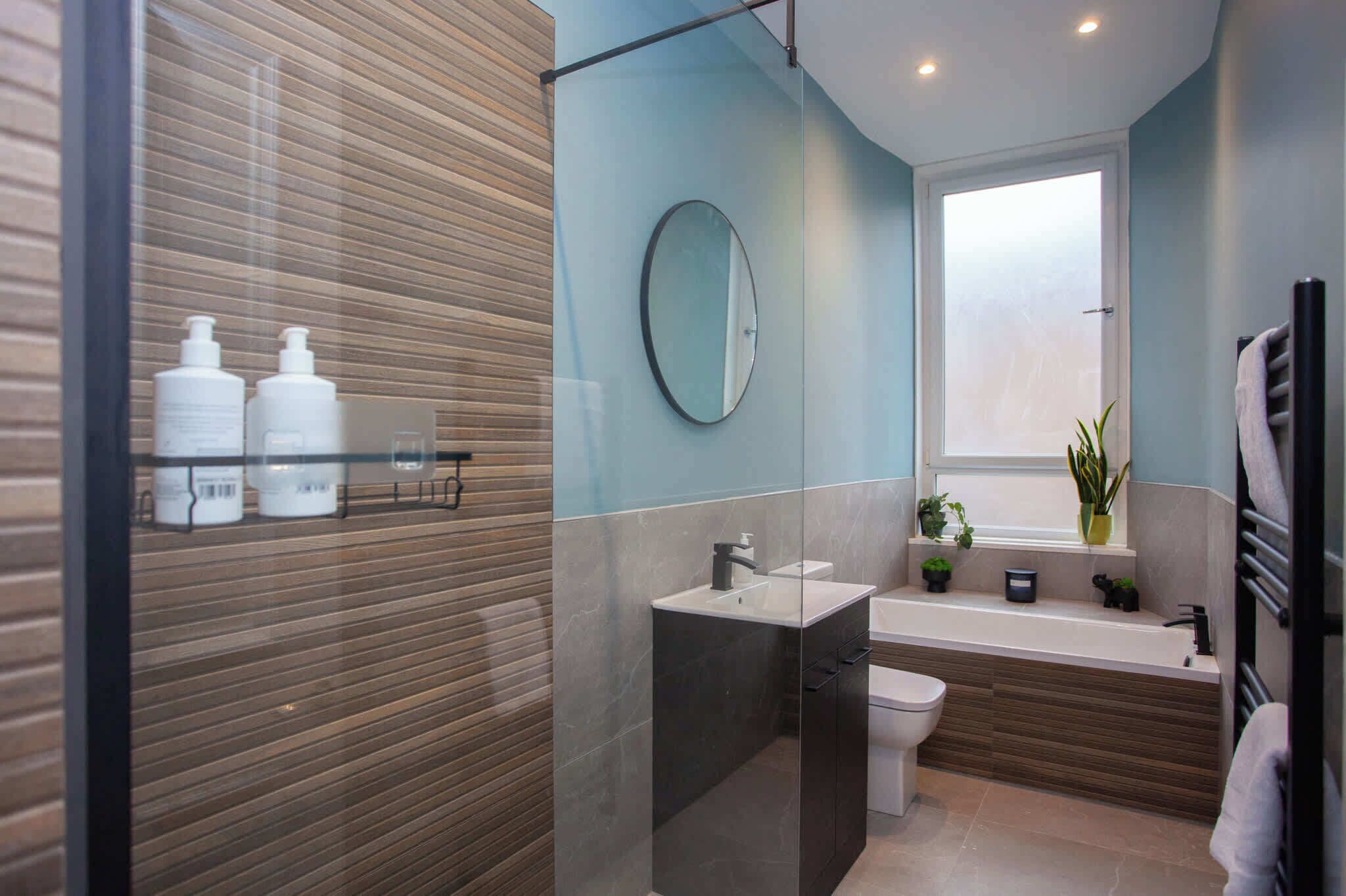 Shower, hair dryer, towels, shampoo