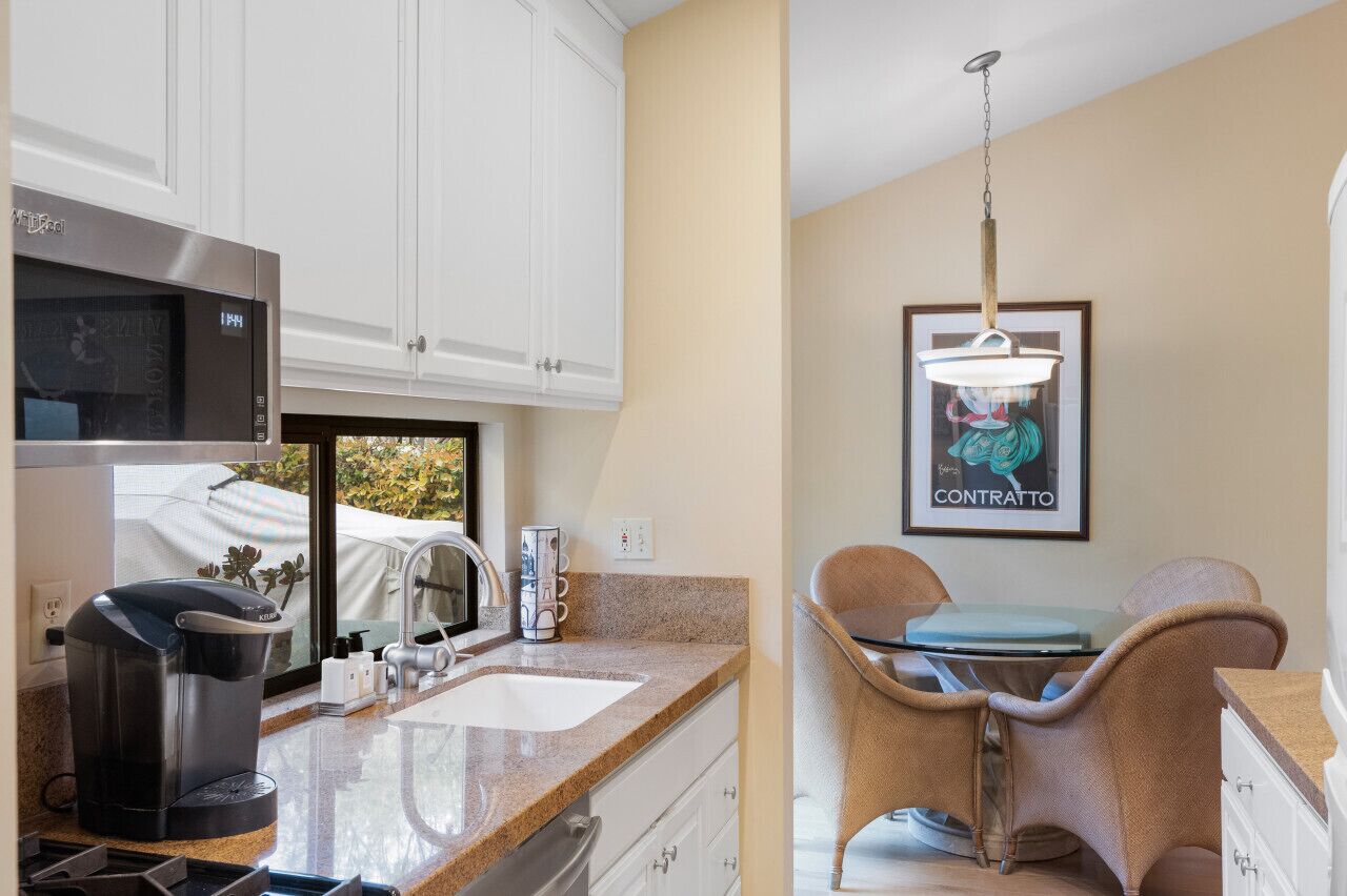 Morning coffee and breakfast here would be a dream! Love how the kitchen opens up to this charming nook