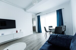 Apartment, Balcony | Living area | Flat-screen TV