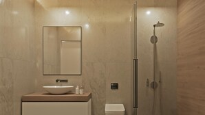 A modern bathroom with a large mirror, a vessel sink, a toilet, and a glass-enclosed shower. - Cameo 3 Luxury Villa With Pool (Zakynthos)