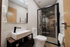 Shower, towels, toilet paper