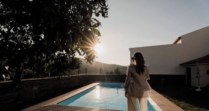 Casa de Xisto - A cozy house surrounded by the vineyard terraces of the Douro.