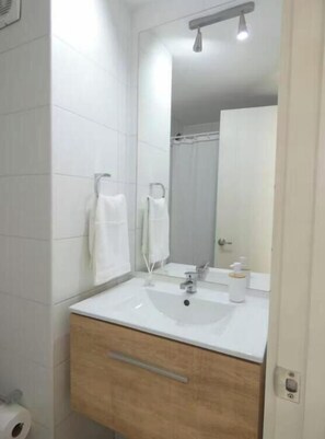 Hair dryer, towels, soap, toilet paper