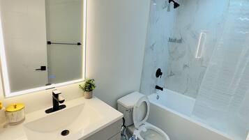 Hair dryer, towels, soap, toilet paper