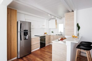 Duplex, sacada, vista para o jardim | Cozinha privada