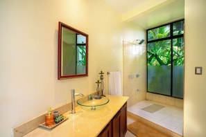 Shower, hair dryer, towels, soap