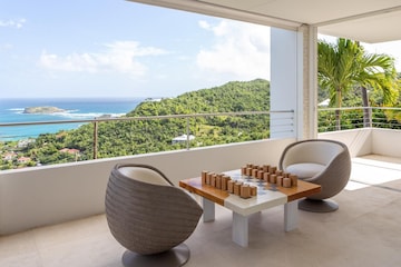 Outdoor terrace dining under Caribbean sky