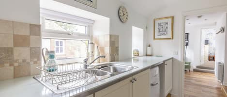 Chaleira elétrica, toalhas de papel