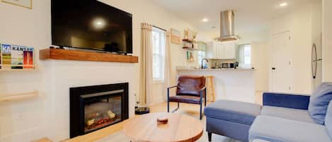 Smart TV, fireplace, foosball, books