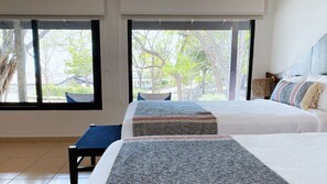 Chambre Double, 2 grands lits, patio, vue océan