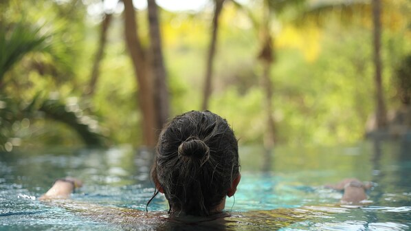 Outdoor pool, pool umbrellas, pool loungers