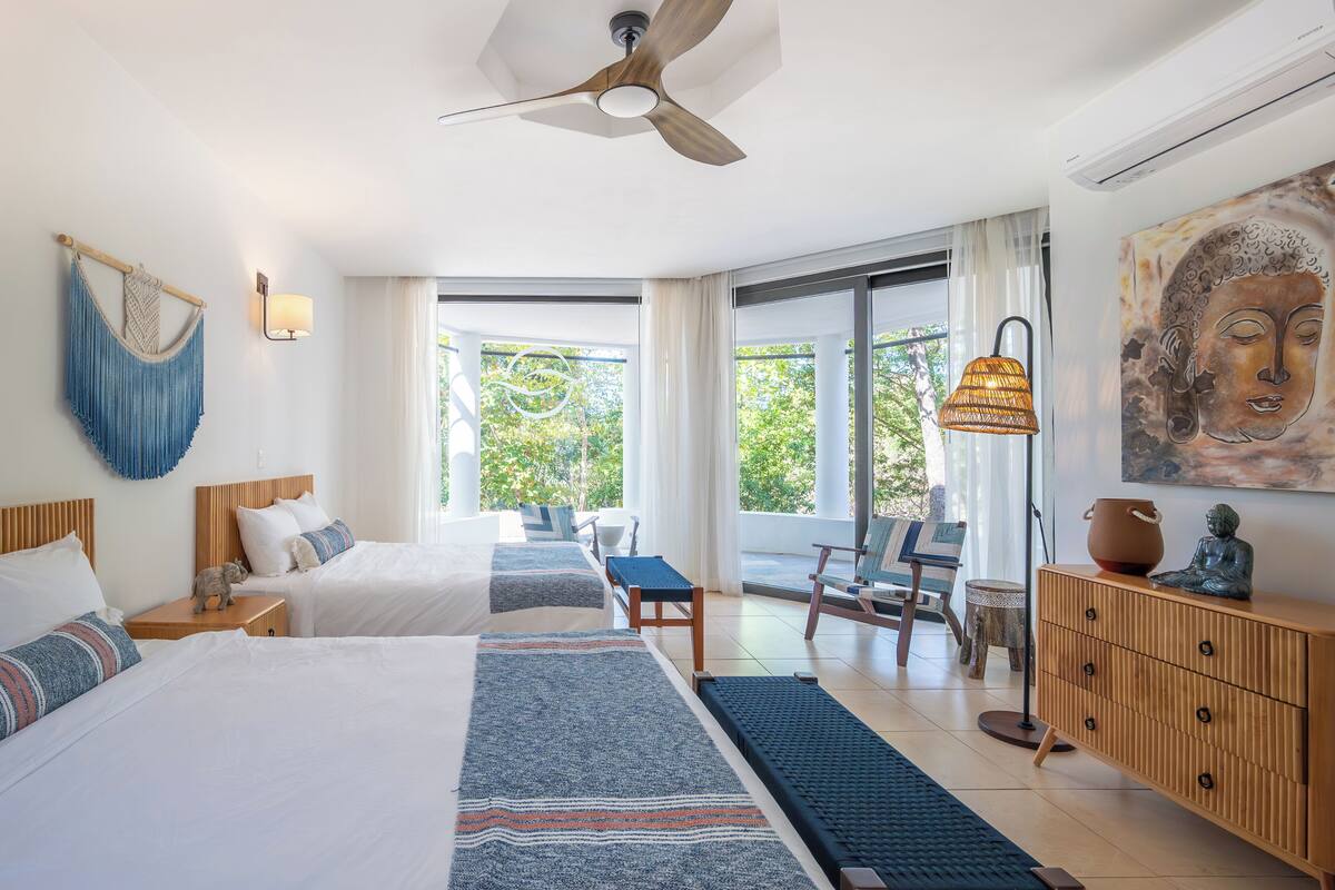 Double Room, 2 Queen Beds, Patio, Pool View | In-room safe, WiFi (free), bed sheets