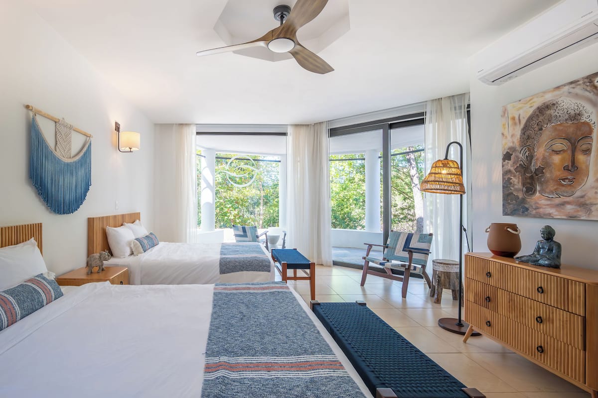 Double Room, 2 Queen Beds, Patio, Pool View | In-room safe, free WiFi, bed sheets