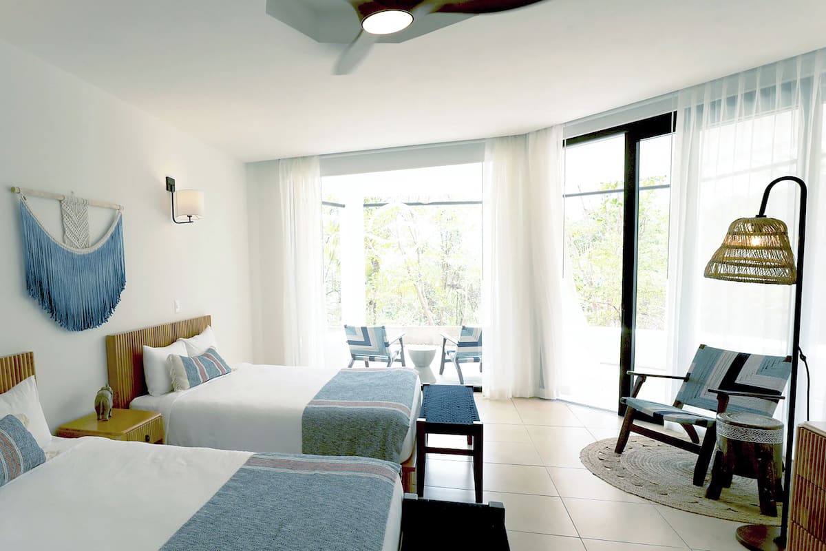 Double Room, Patio, Pool View | 1 bedroom, in-room safe, free WiFi, bed sheets