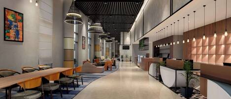 A modern hotel lobby with a long reception desk, seating area, and a large abstract painting on the wall.