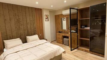 Doppia Deluxe | Biancheria da letto di alta qualità, materassi in memory foam, minibar