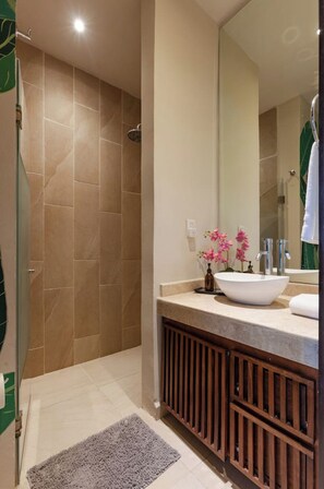 Shower, hair dryer, towels, soap