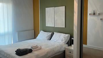 2 habitaciones, tabla de planchar con plancha y wifi gratis