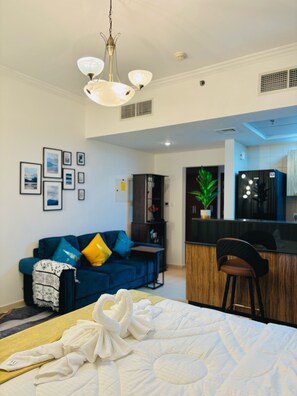 Deluxe Studio Suite, Balcony, City View | Living area | 43-inch Smart TV with digital channels - Stunning Studio Dubai with Rooftop Pool  (Dubai)