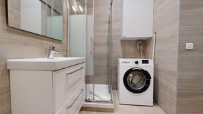 Shower, hair dryer, towels