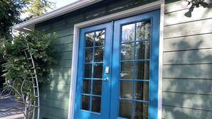 A house with a blue door and a small porch. - Blue Door at Lake Serene (Lynnwood)