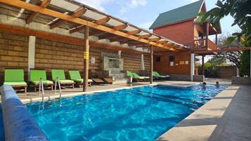 Outdoor pool, sun loungers