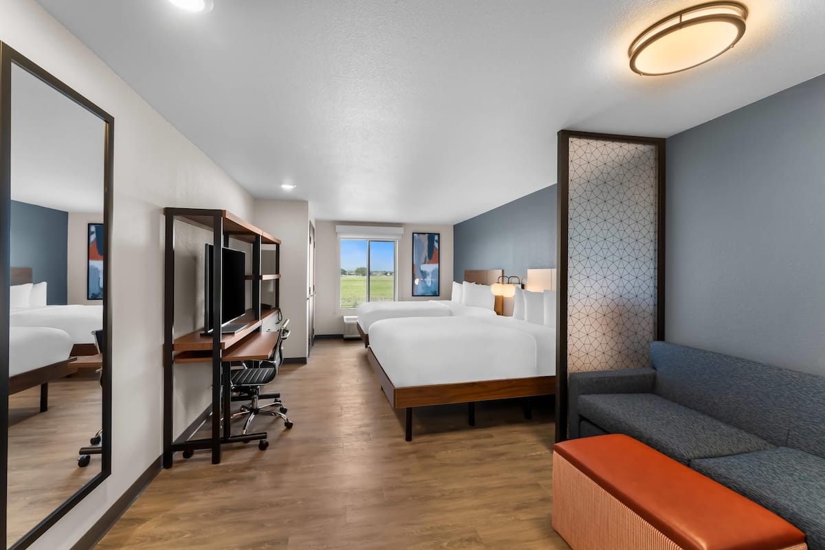 Suite, 2 Queen Beds, Non Smoking | Desk, laptop workspace, blackout drapes, free WiFi
