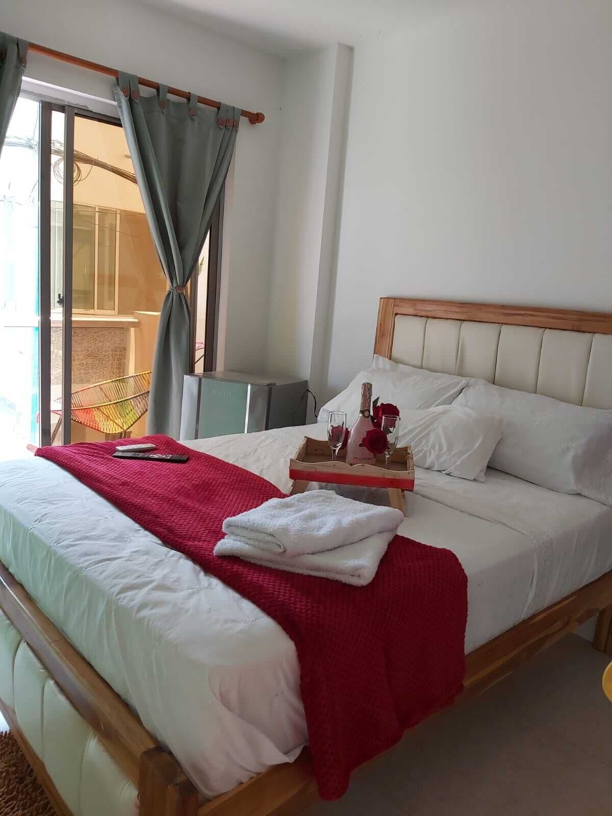 Hypo-allergenic bedding, down duvets, minibar, laptop workspace