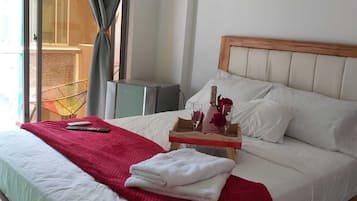 Hypo-allergenic bedding, down duvets, minibar, laptop workspace