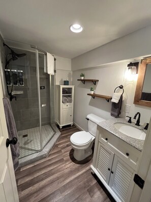 Shower, towels, soap, shampoo