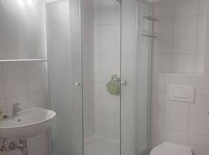 Dutxa, assecador de cabells i tovalloles