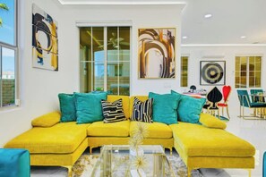 Smart TV, fireplace, foosball, books