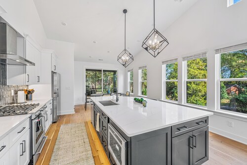 Modern 4BR Home Near Uptown & Camp North End- Sleeps 12, Sports-Themed Game Room