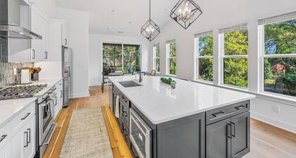 Modern 4BR Home Near Uptown & Camp North End- Sleeps 12, Sports-Themed Game Room