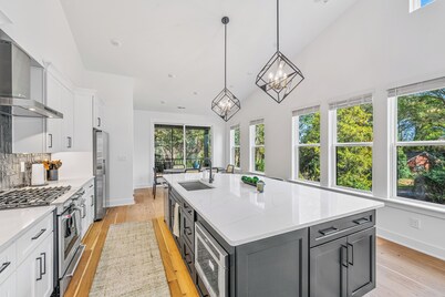 Modern 4BR Home Near Uptown & Camp North End- Sleeps 12, Sports-Themed Game Room