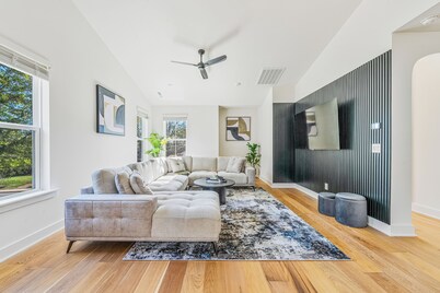 Modern 4BR Home Near Uptown & Camp North End- Sleeps 12, Sports-Themed Game Room
