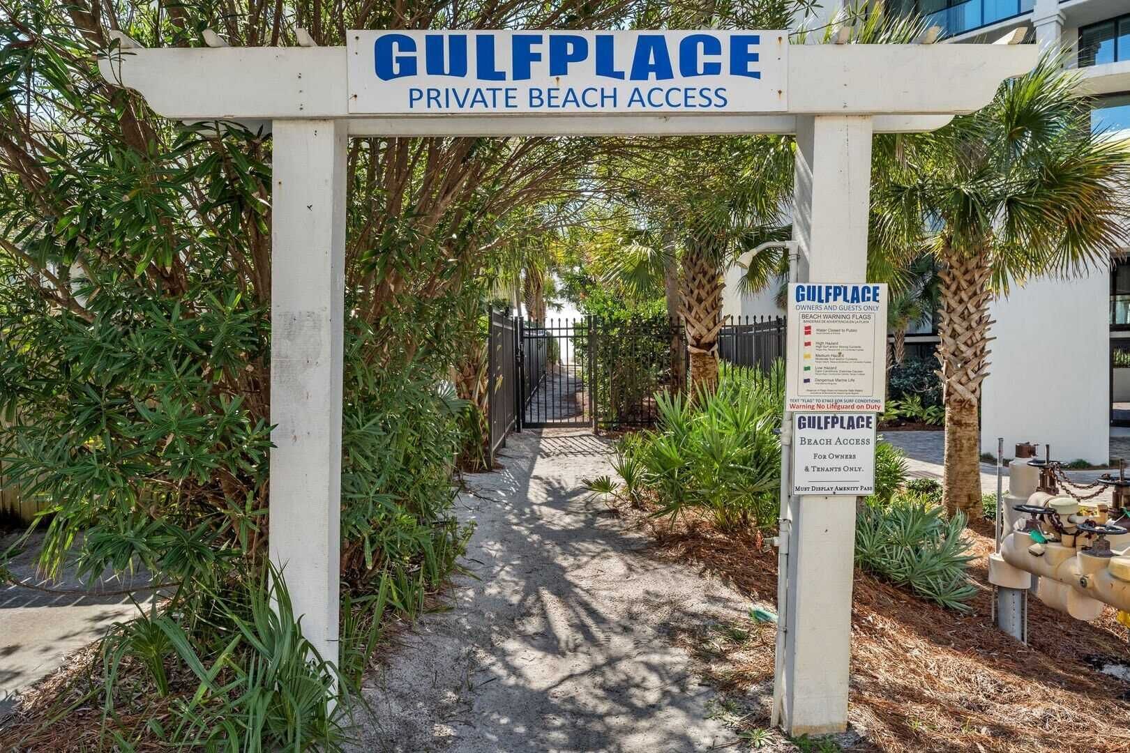 A gated entrance to Gulfplace with a sign indicating private beach access.
