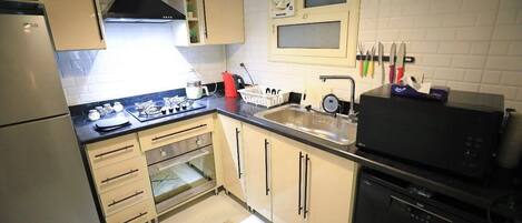 Four Ă micro-ondes, un four, surface de cuisson, lave-vaisselle