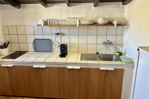 Fridge, microwave, coffee/tea maker, toaster