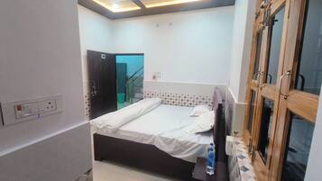 Deluxe Double Room, City View | In-room safe, desk, laptop workspace, blackout curtains