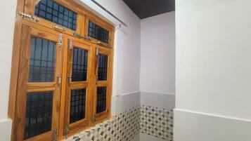 Deluxe Double Room, City View | In-room safe, desk, laptop workspace, blackout curtains