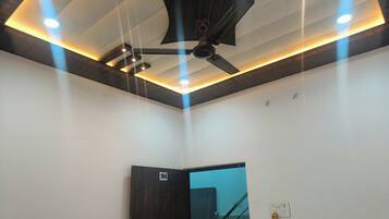 Deluxe Double Room, City View | In-room safe, desk, laptop workspace, blackout curtains