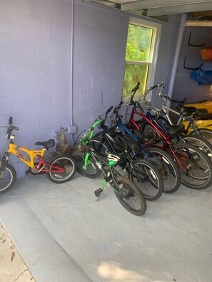A garage with bicycles parked inside.