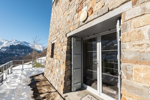 Chalet "De Sers" avec vue sur les montagnes, terrasse privée et Wi-Fi