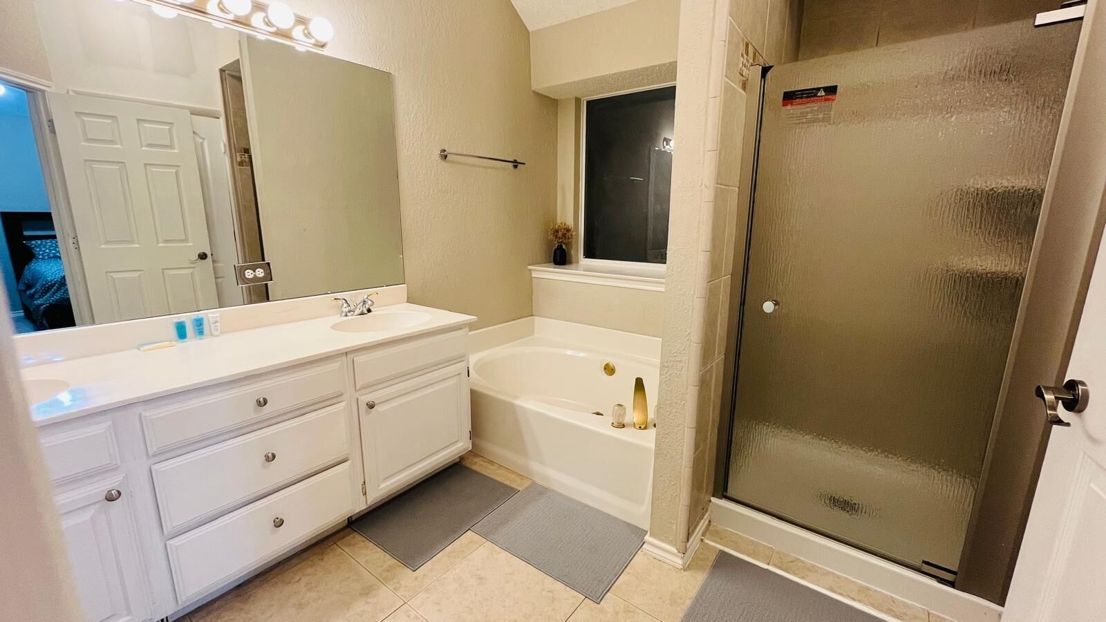 Shower, towels, soap, toilet paper