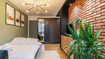 2 dormitorios, tabla de planchar con plancha, wifi y ropa de cama