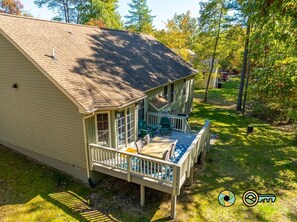A house with a deck, a covered outdoor area, and a swimming pool. - Pine Cone Paradise - escape to luxury! (Mount Jackson)