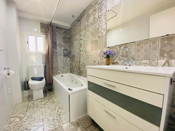 Hair dryer, towels, soap, toilet paper